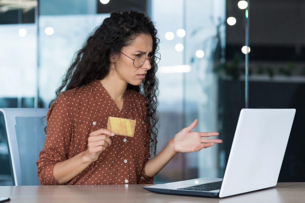 Upset and disappointed businesswoman working in modern office